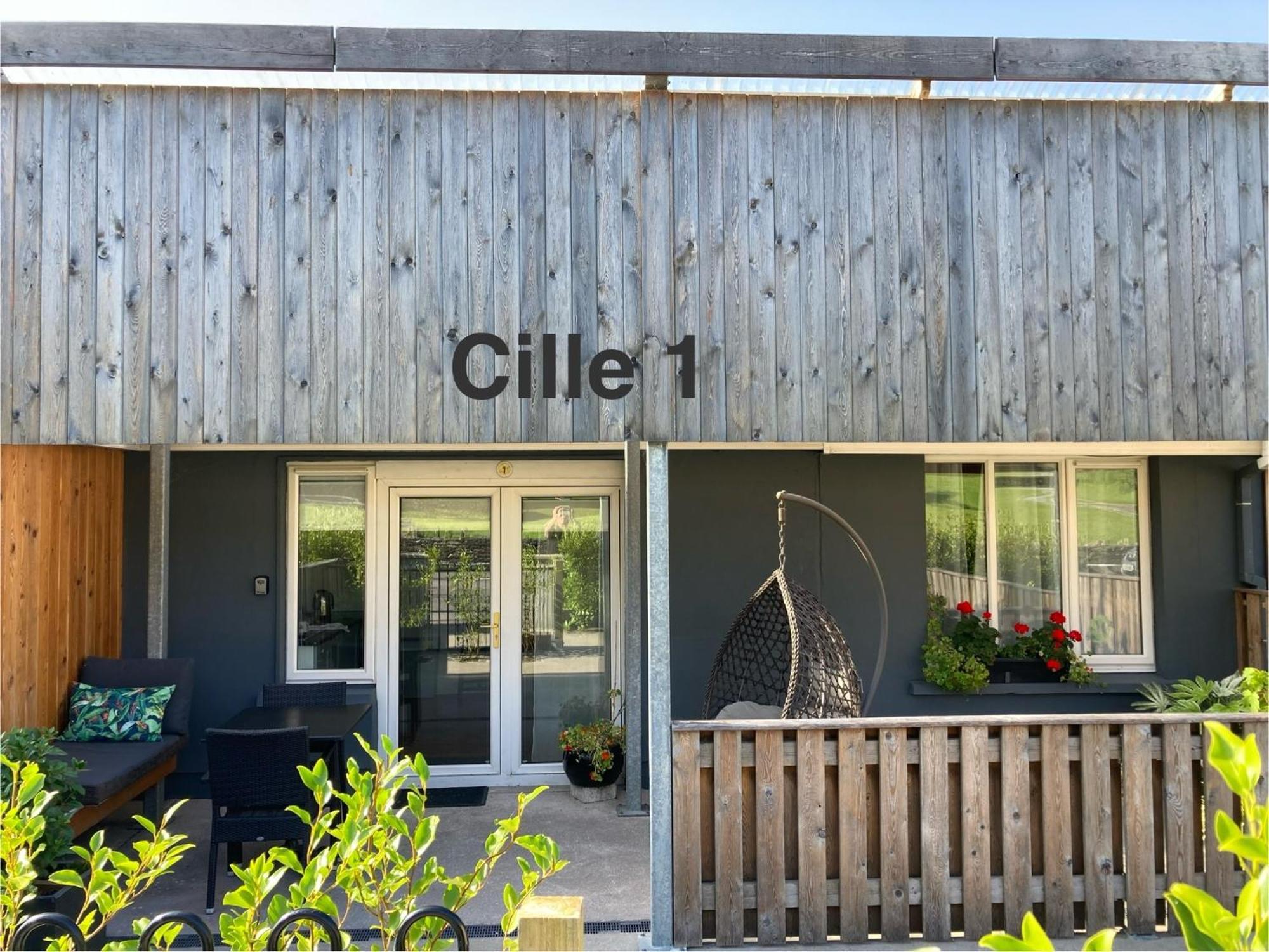 Cille Apartments, Village